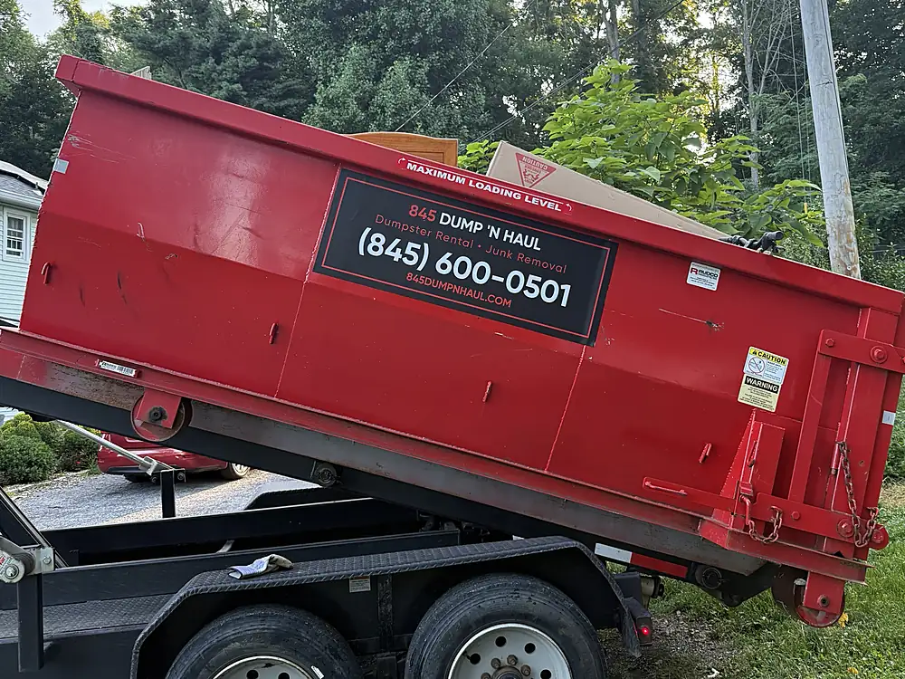 Close-up of the 845 Dump \u2019N Haul container branding in Wappingers Falls, NY — 845 Dump 'N Haul
