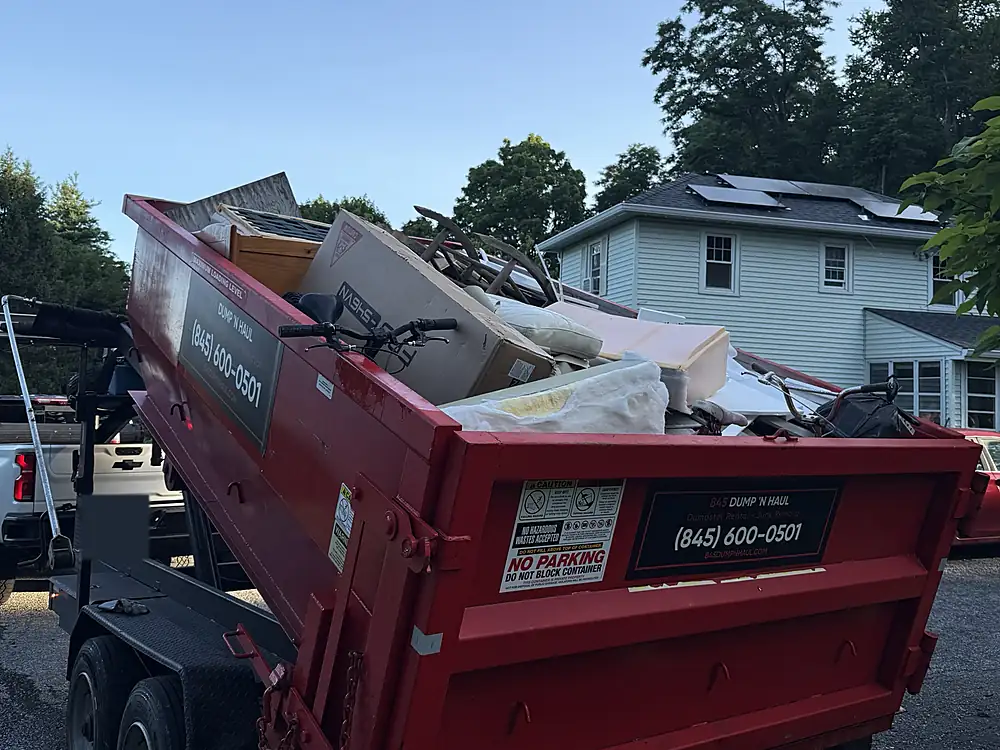 Dumpster filled during a full household cleanout in LaGrangeville, NY — 845 Dump 'N Haul