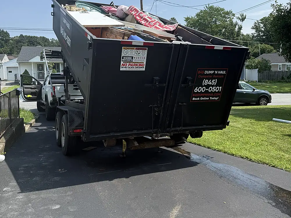 Full roll-off dumpster loaded for haul-away in Rhinebeck, NY — 845 Dump 'N Haul