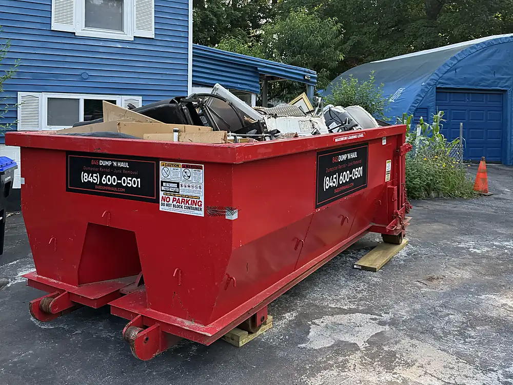 Dumpster loaded with old appliances and scrap metal in Newburgh, NY — 845 Dump 'N Haul