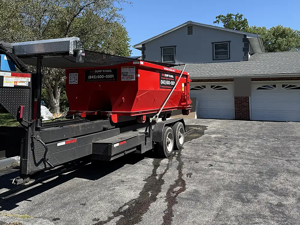 Dumpster delivery to a two-car garage driveway in Rhinebeck, NY — 845 Dump 'N Haul