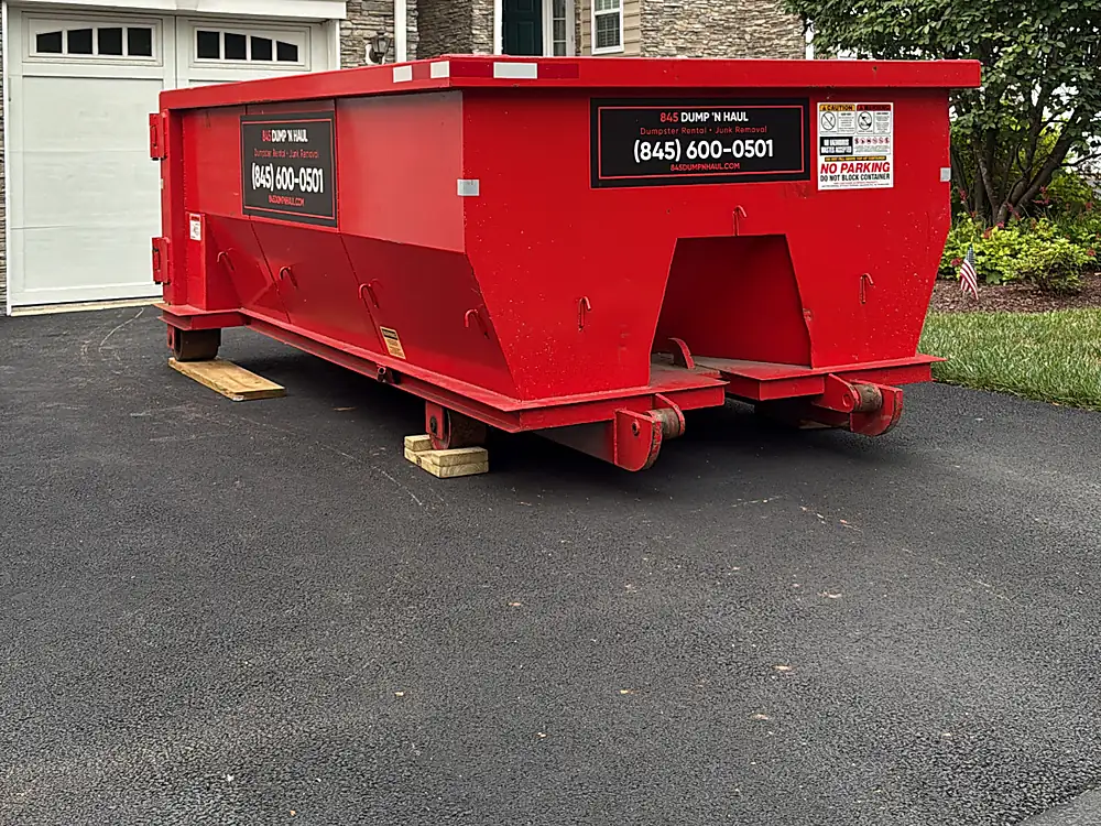 Roll-off dumpster at a Dutchess County townhouse community in Newburgh, NY — 845 Dump 'N Haul